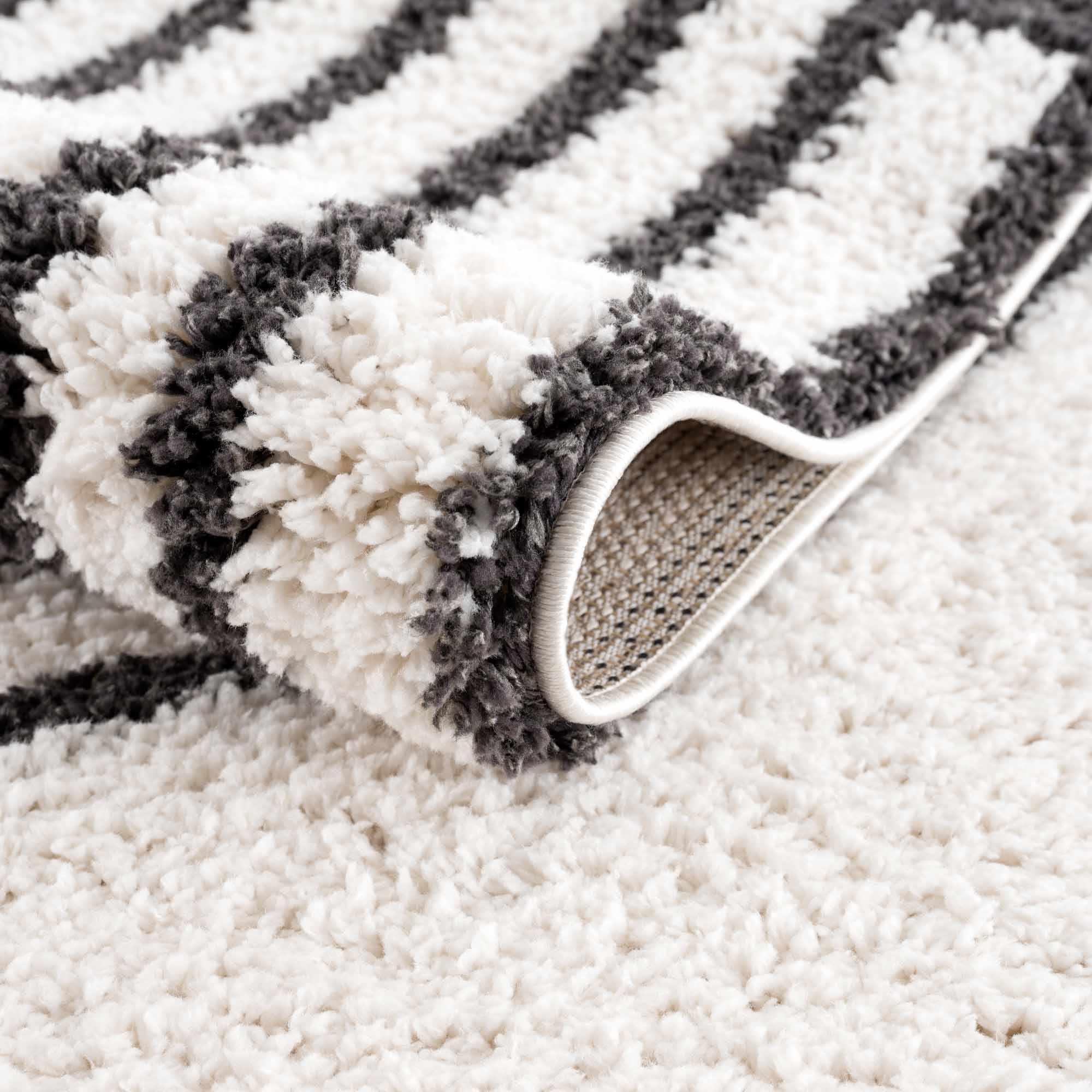Bauer Black & White Shag Area Rug | Rainbow Design