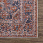 Taber Burnt Orange Area Rug
