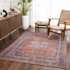 Taber Burnt Orange Area Rug