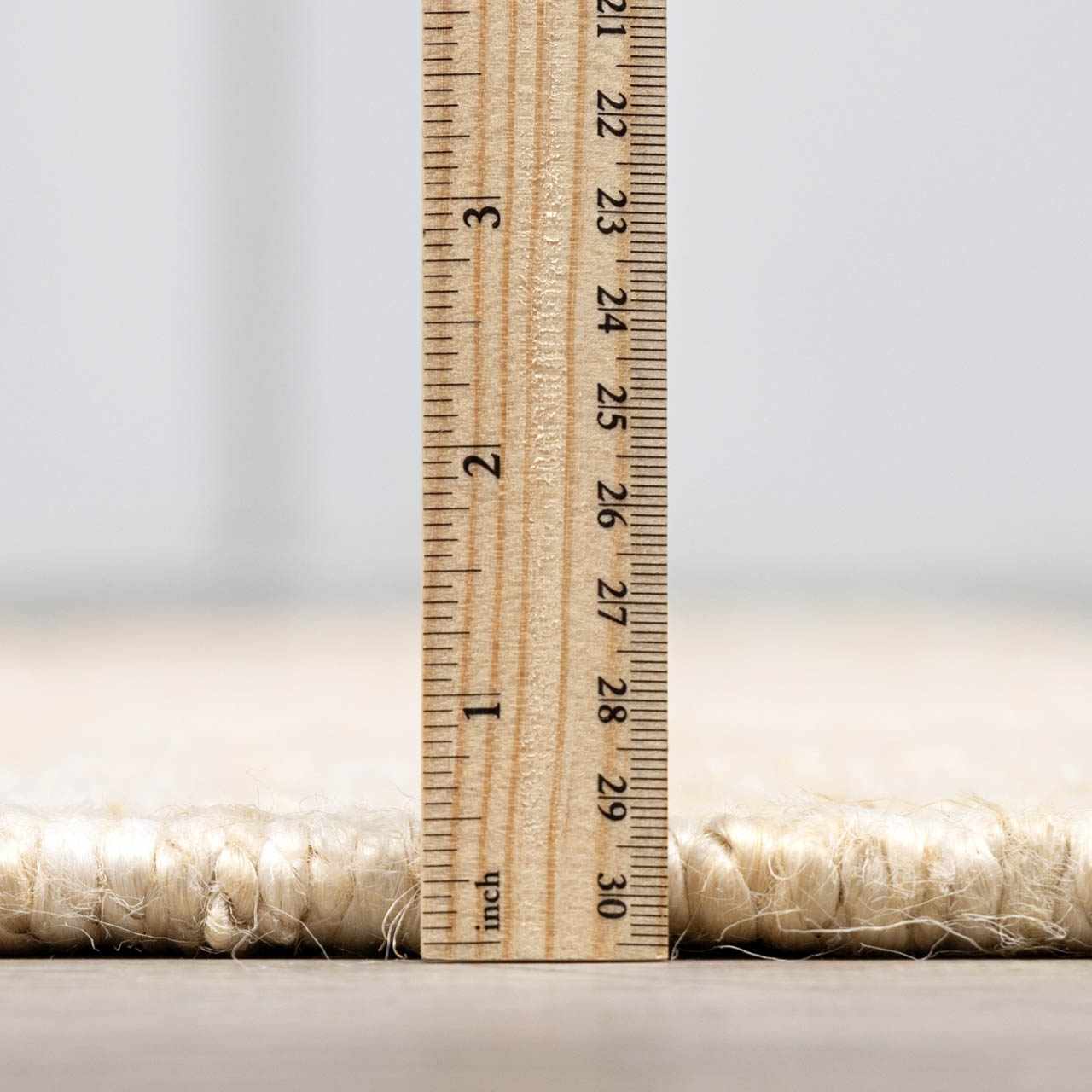 Iantha Tasseled Jute Area Rug