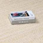 Iantha Tasseled Jute Area Rug