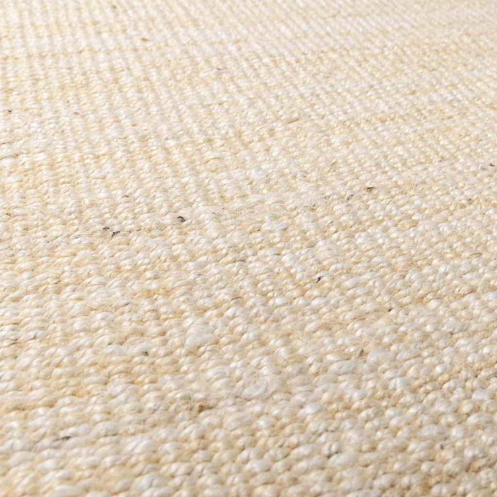 Iantha Tasseled Jute Area Rug
